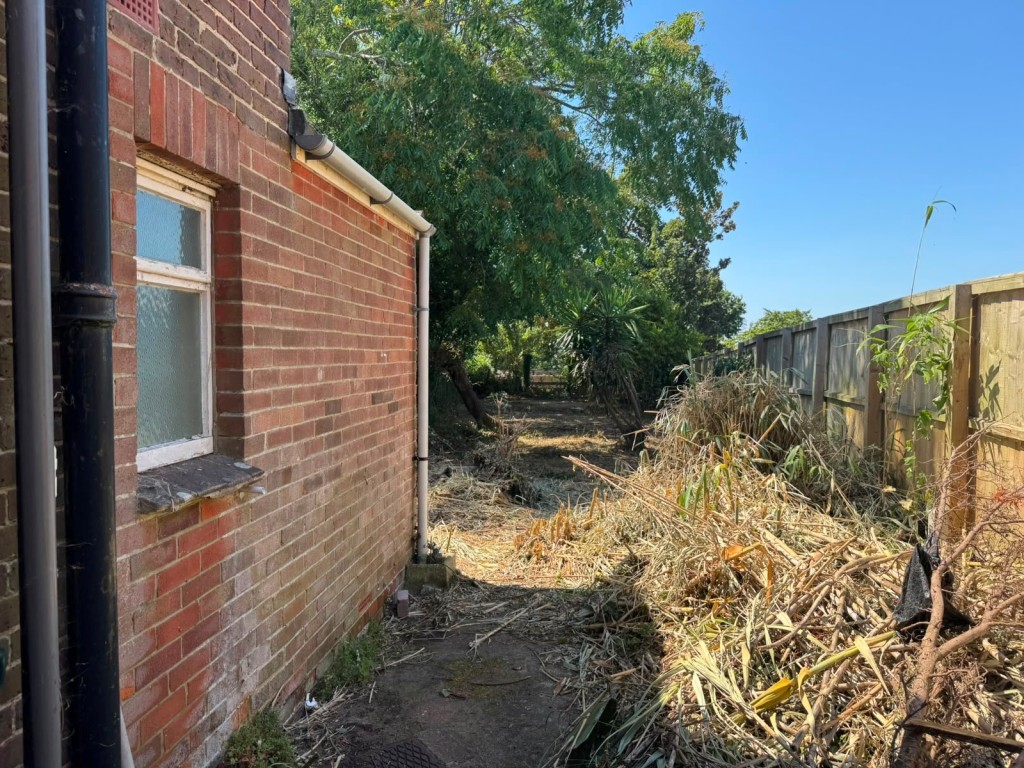 Lot: 141 - SEMI-DETACHED HOUSE FOR IMPROVEMENT - Looking Down the Garden From the House
